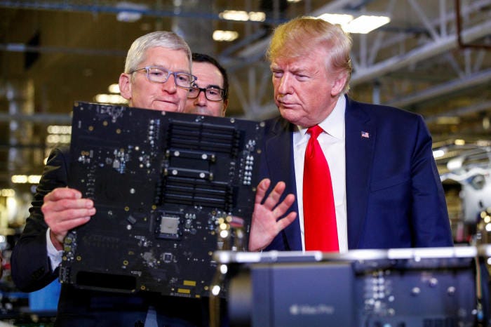 Apple CEO Tim Cook escorted President Trump on a tour of an Apple manufacturing plant in Austin, Texas, in 2019.