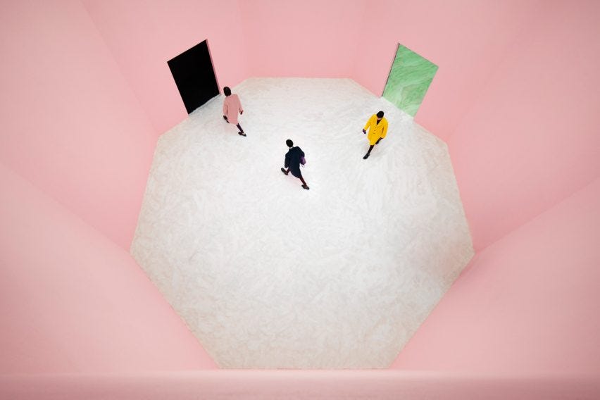 pink hued room at Prada show by AMO 