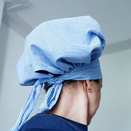 hair bonnet for sleeping on a women’s head back view with knot at the back hair bonnet for sleeping on a women’s head back view with knot at the back