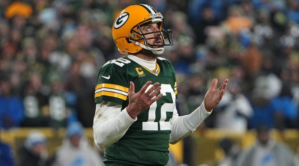 Aaron Rodgers implorando al cielo.