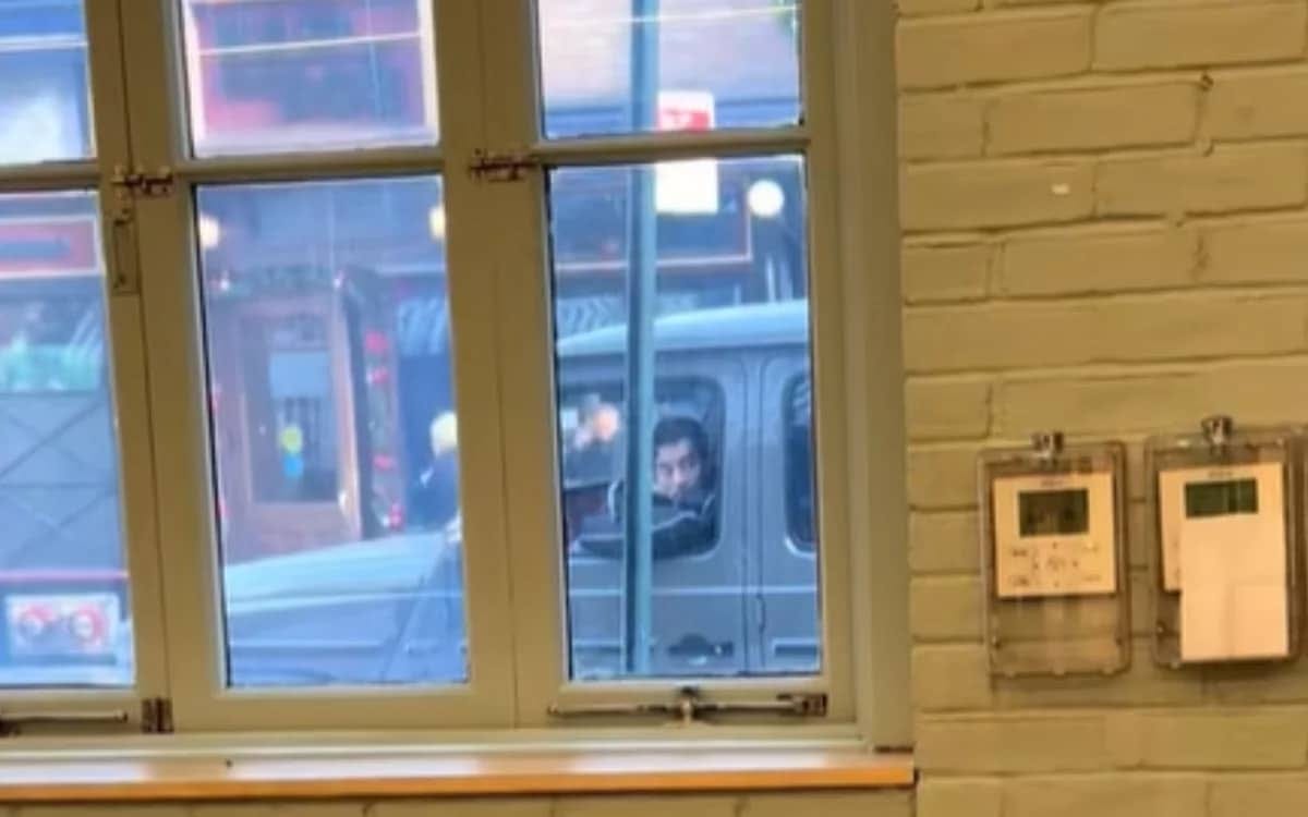 Joe Jonas in his car visible through a window, looking stressed as he tries to parallel park Joe Jonas in his car visible through a window, looking stressed as he tries to parallel park