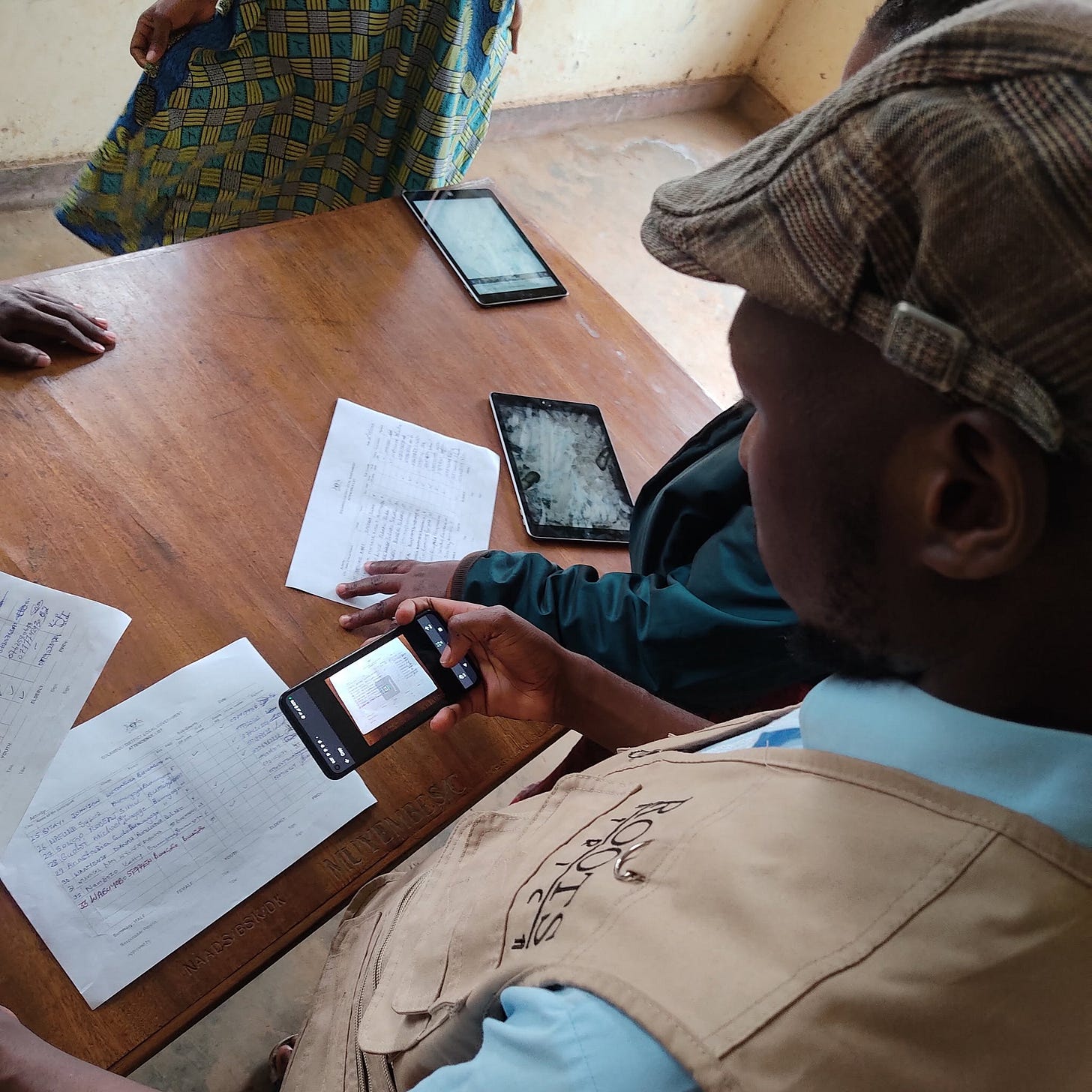 May be an image of one or more people, people studying and text
