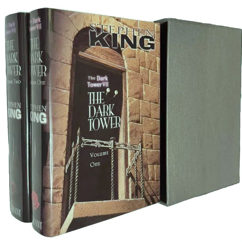 The cover of volume one of the limited edition of THE DARK TOWER by Stephen King. The books are slid out of the slipcase with first cover showing.