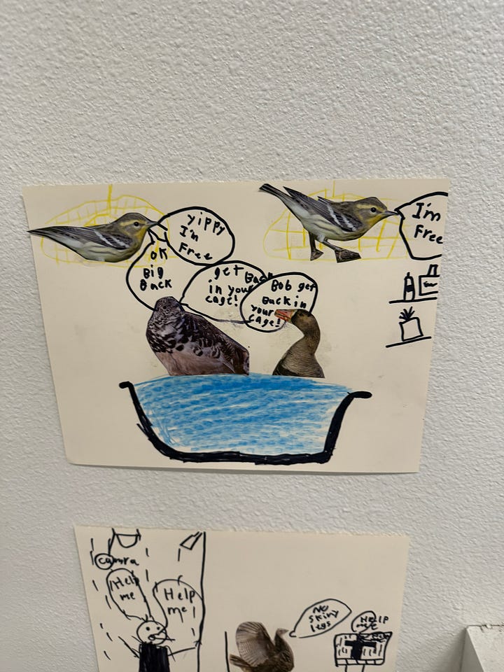 Children's art on the wall at a town council meeting