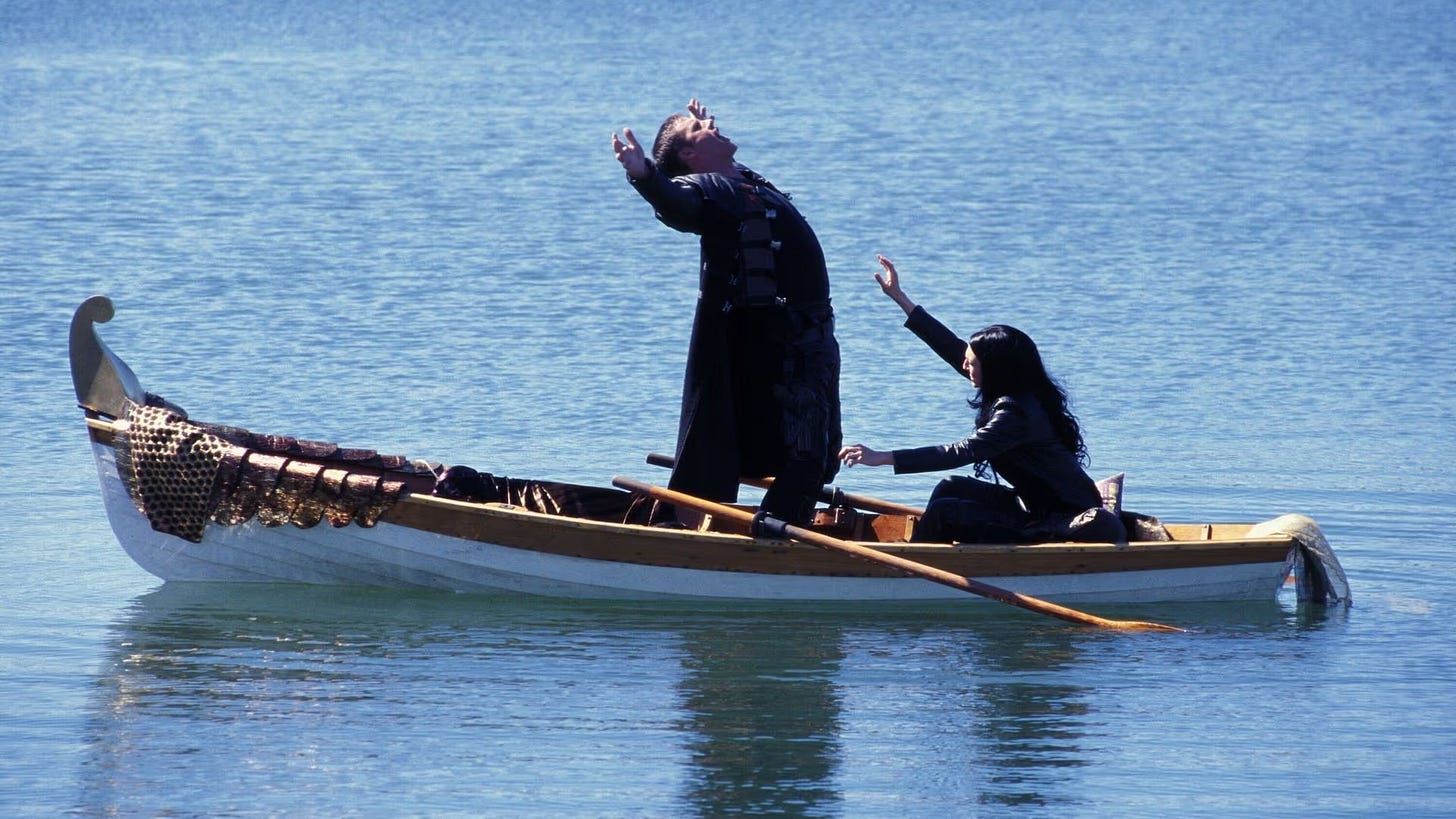 Final scene from the Farscape Series, Aeryn has just told John that she's pregnant and John stands in a boat to celebrate shortly before they are killed.