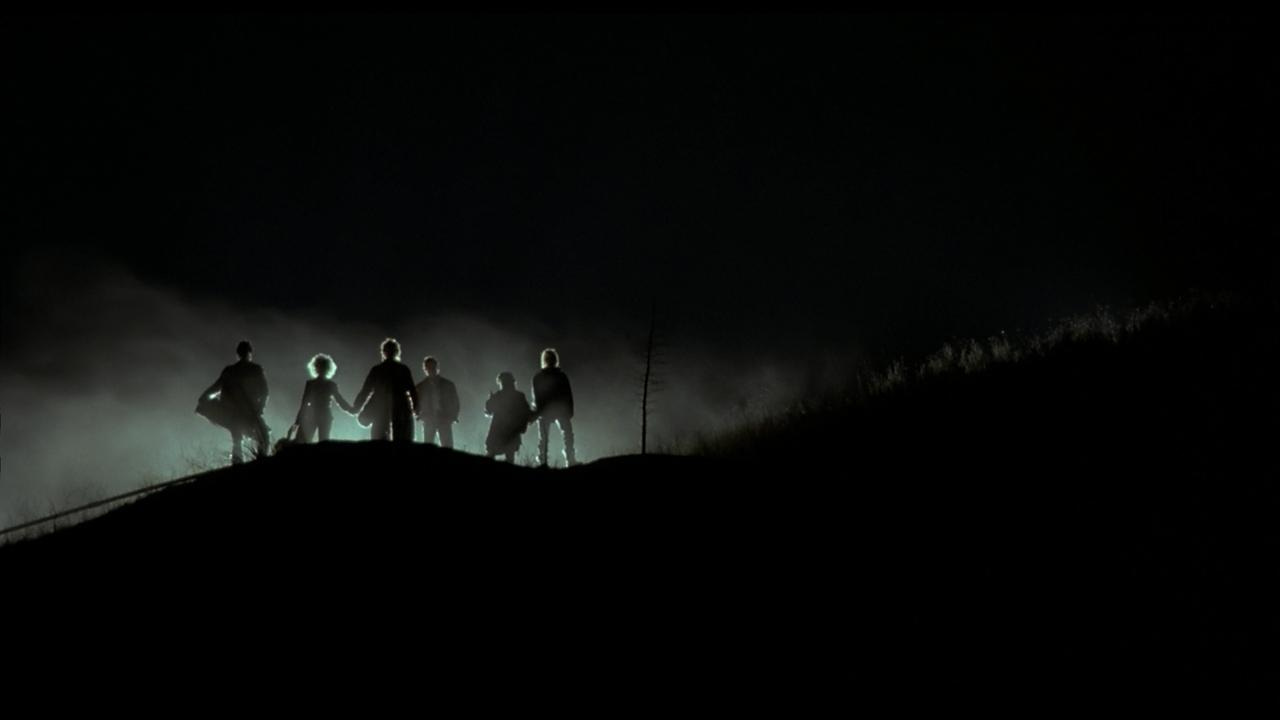 Near Dark | Still features vampires in silhouettes against the dark.
