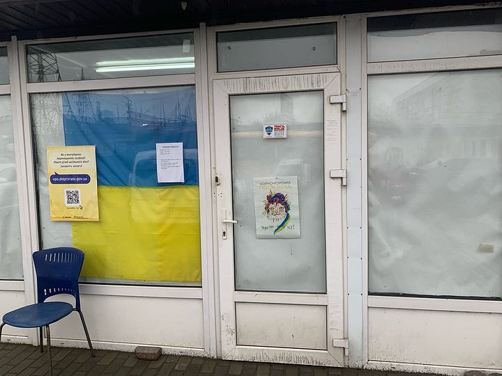 mages of hand-made pro-Ukraine wall posters featuring cats at a community help center in Dnipro, Ukraine.