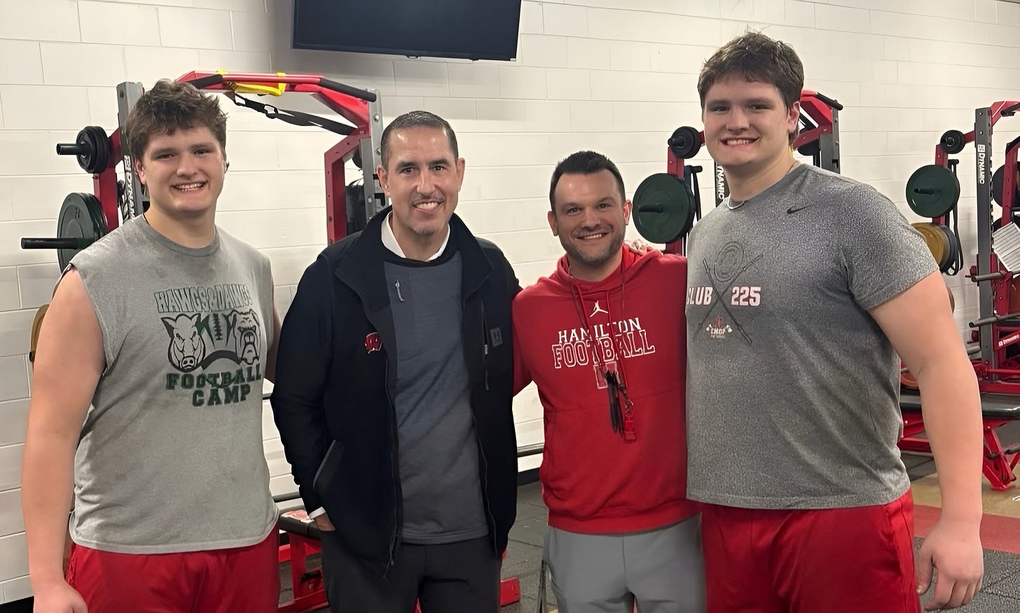 Wisconsin Badgers head coach Luke Fickell pictured with in-state commits Hunter and Reece Mallinger.
