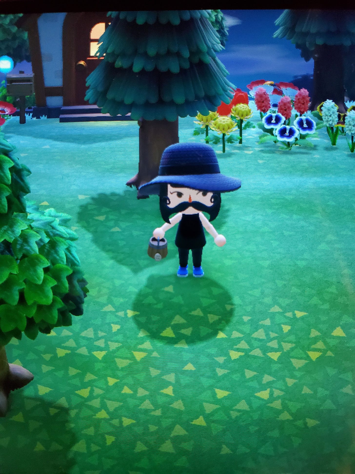 a character from the game Animal Crossing, dressed in all black, wearing a black hat, with a black mustache, standing in a video game field at night