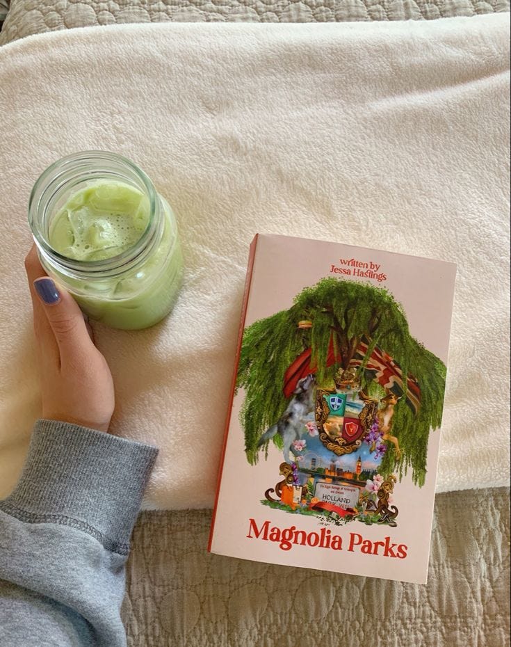 This may contain: a person laying on a bed next to a jar of green liquid and a book