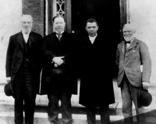 (Left to right) Business man Robert C. Ogden, U.S. Secretary of War and future US president William Howard Taft, Booker T. Washington and Andrew Carnegie, standing on the steps of a building, at the Tuskegee Institute's 25th anniversary celebration. (April 1906) (Left to right) Business man Robert C. Ogden, U.S. Secretary of War and future US president William Howard Taft, Booker T. Washington and Andrew Carnegie, standing on the steps of a building, at the Tuskegee Institute's 25th anniversary celebration. (April 1906)
