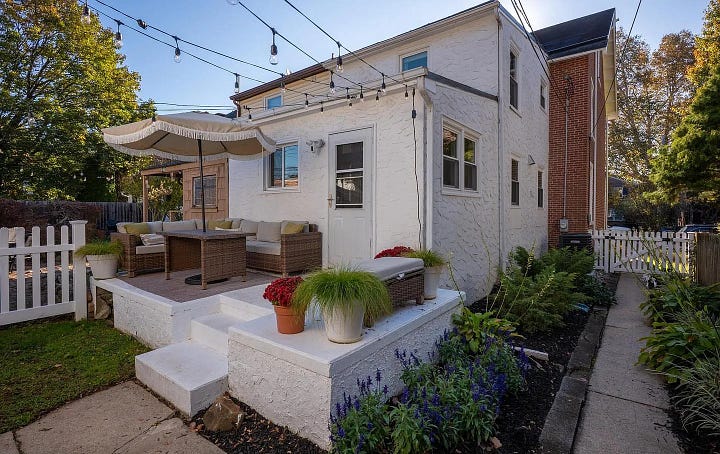 Rear patio and primary bedroom