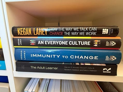 stacks of books on boundaries, equal partnership, parenting, adult learning, women's health, time management, leadership, self-discovery