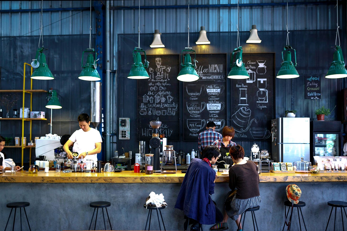 Friends in cafe by  Quang Nguyen Vinh