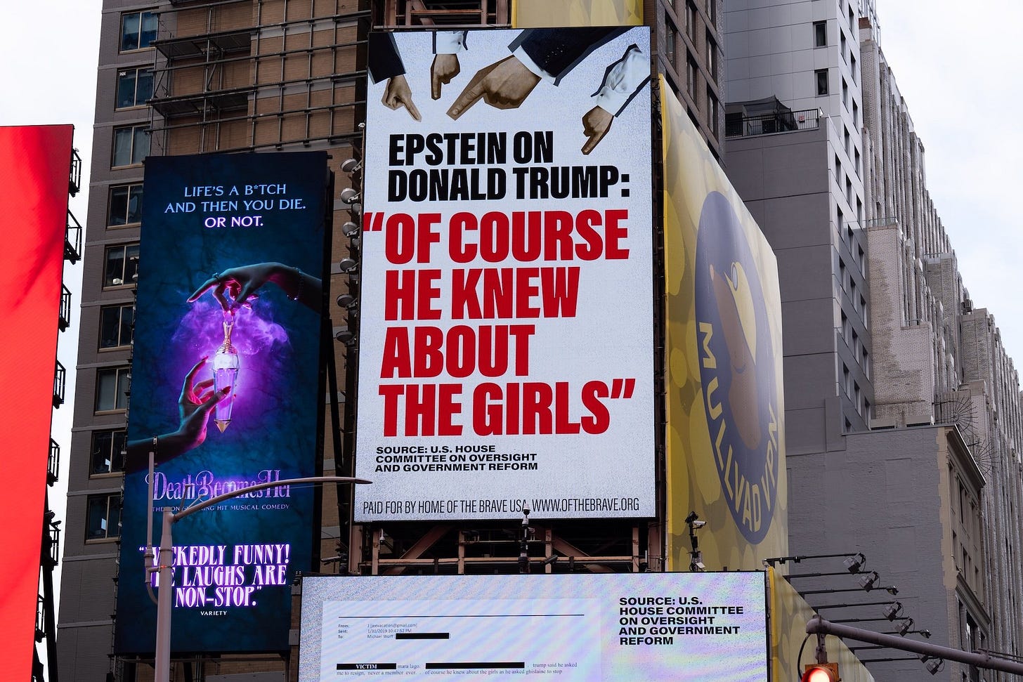 A billboard in Times Square, paid for by the group Home of the Brave, highlights Jeffrey Epstein's comment that Donald Trump "of course he knew about the girls.", on November 17, 2025 in New York City.