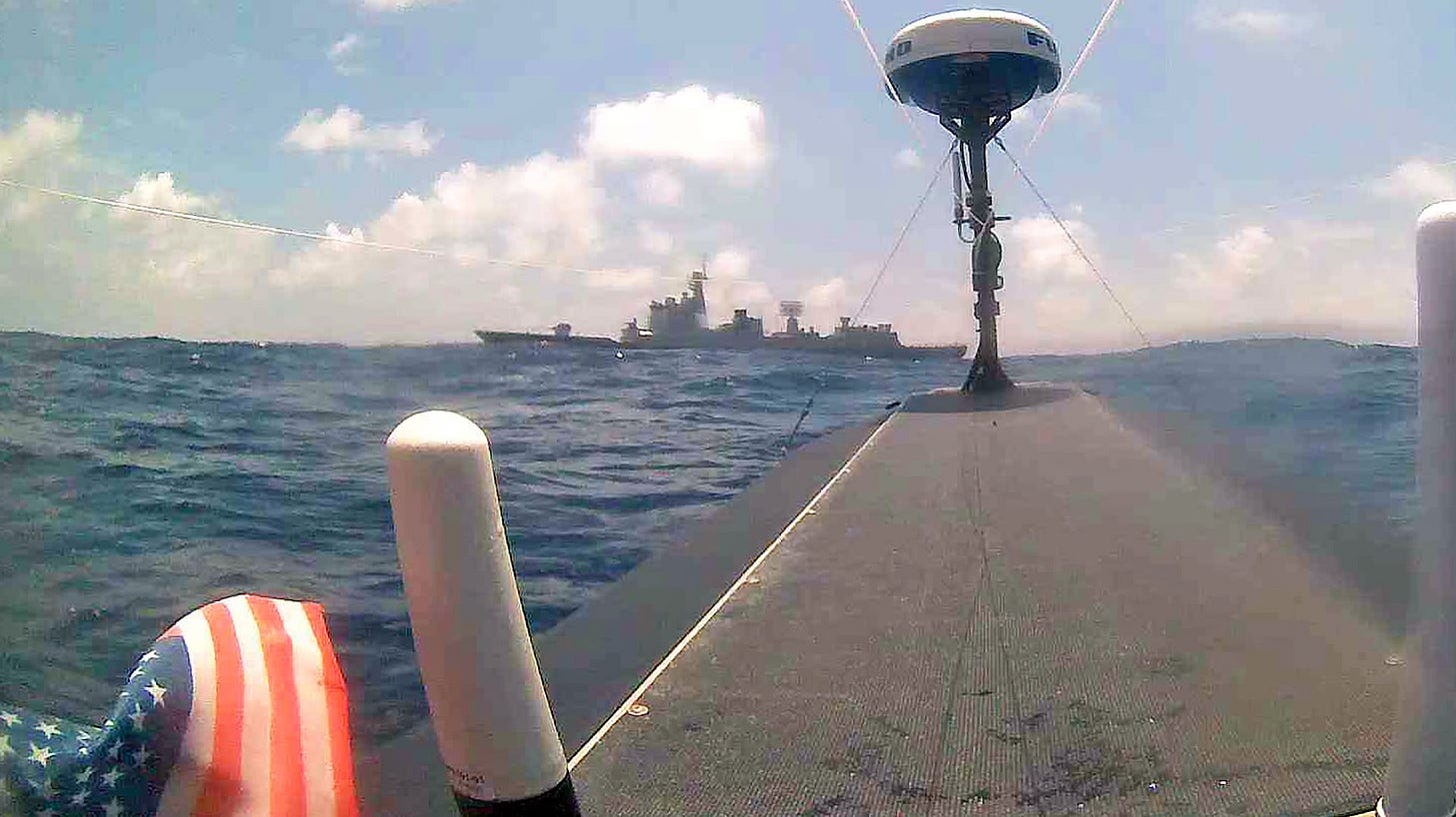 A view of the Chinese Type 052D guided missile destroyer from the Seasats Lightfish uncrewed surface vessel. A view of the Chinese Type 052D guided missile destroyer from the Seasats Lightfish uncrewed surface vessel.