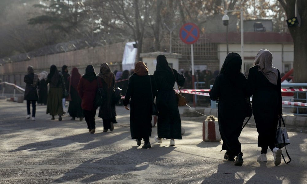 A group of people walking on a street

Description automatically generated with medium confidence