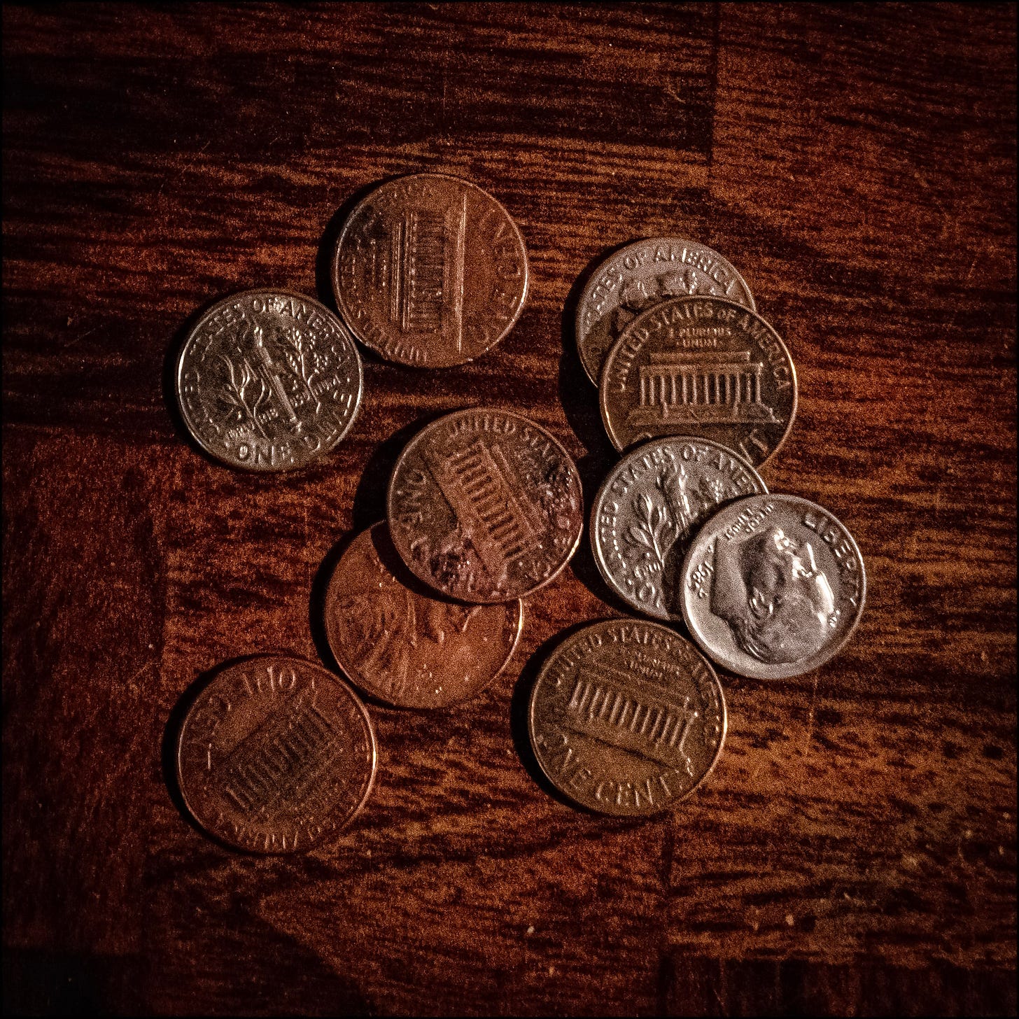 Ten US coins -- four dimes, six pennies -- totaling 46 cents, which was all I had on hand when I took this photo in December 2020.
