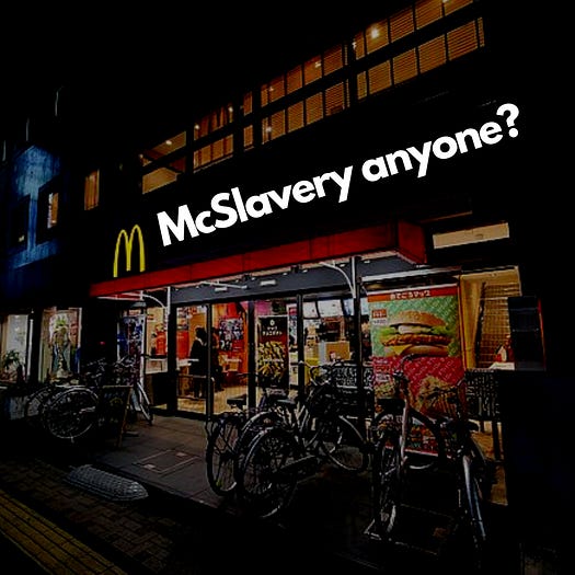 McDonald’s restaurant with the words ‘McSlavery Anyone’ replacing the McDonald’s name. McDonald’s restaurant with the words ‘McSlavery Anyone’ replacing the McDonald’s name.