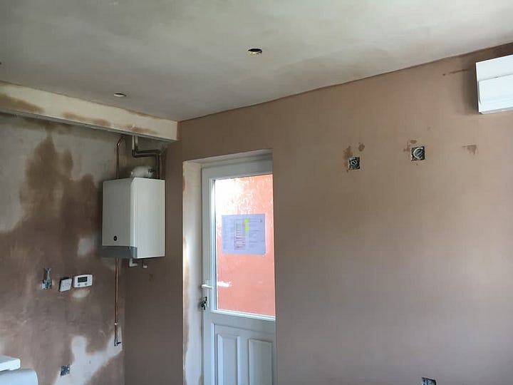 New ceiling and freshly plastered walls