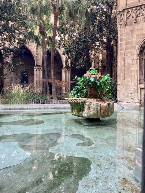 The Surrender--pics of gardens, flowers, cross, and archway