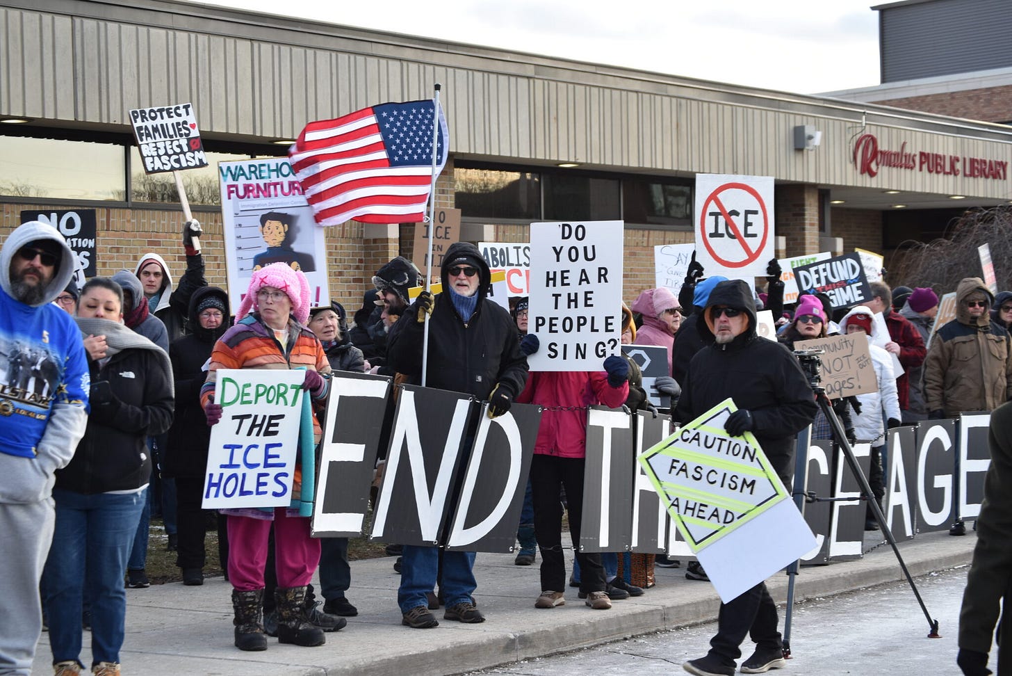 Hundreds rally as Romulus council rejects ICE detention center plan •  Michigan Advance