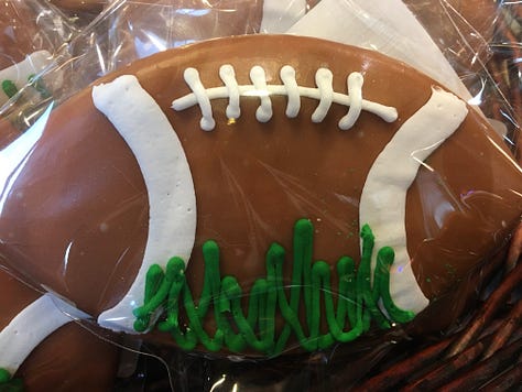 Grilled peaches, ice cream, football cookie