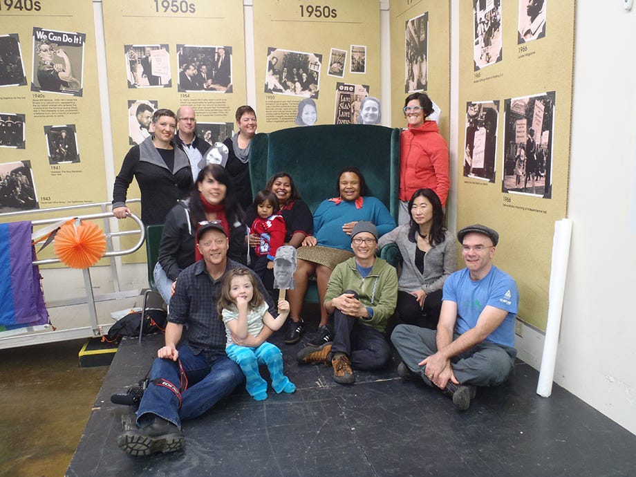 A group of people smiling at the camera