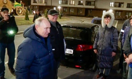 Screengrab from video released by Russian TV on 19 March of Vladimir Putin talking to residents in Mariupol. Screengrab from video released by Russian TV on 19 March of Vladimir Putin talking to residents in Mariupol.