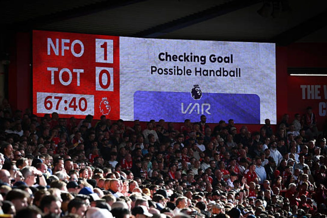 Video assistant referees check for a possible handball during the Premier League match between Nottingham Forest and Tottenham Hotspur at the City Ground in Nottingham, on September 5, 2026. (Photo by Jon Hobley/MI News/NurPhoto via Getty Images) Video assistant referees check for a possible handball during the Premier League match between Nottingham Forest and Tottenham Hotspur at the City Ground in Nottingham, on September 5, 2026. (Photo by Jon Hobley/MI News/NurPhoto via Getty Images)