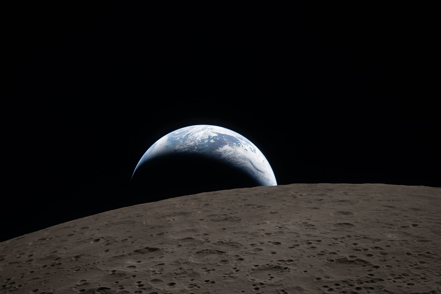 Artemis II crew takes historic photo of Earth setting behind moon | The Times of Israel Artemis II crew takes historic photo of Earth setting behind moon | The Times of Israel