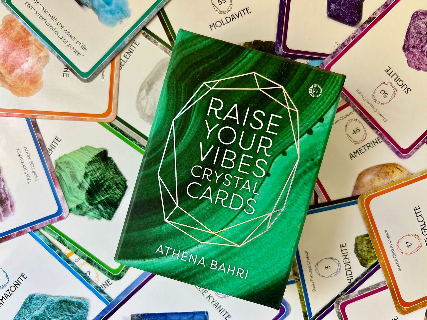 Raise Your Vibes Crystal Cards by Athena Bahri.
