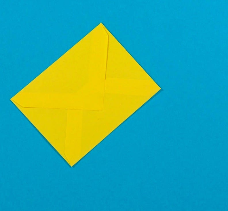 a yellow triangle with a black background