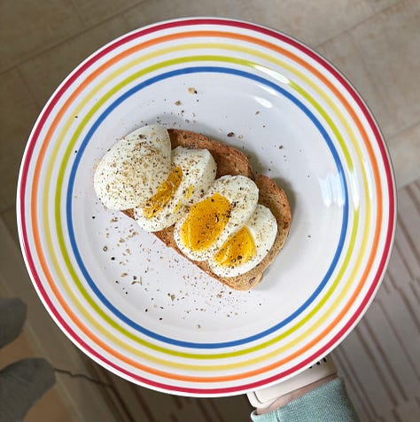 Three photos depicting the author's breakfast (oatmeal), lunch (boiled eggs on toast), and dinner (salad with chicken).