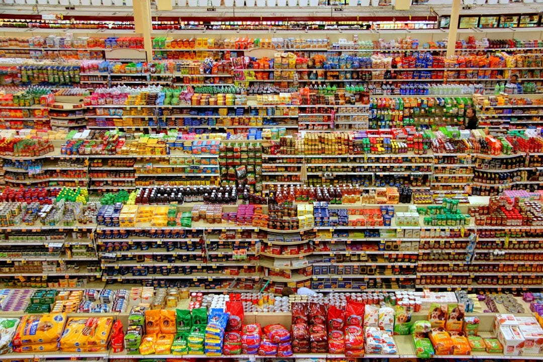 This is an aerial shot of the groceries section of the Fred Meyer superstore in Redmond, WA. I took this picture while on vacation in the Pacific northwest. I had seen a similar picture of a Fred Meyer store in Portland, OR and hear that this store had a publicly accessible vantage for taking an aerial photograph. I took the shot in HDR mode and used Photomatix to produce the finished image. This is an aerial shot of the groceries section of the Fred Meyer superstore in Redmond, WA. I took this picture while on vacation in the Pacific northwest. I had seen a similar picture of a Fred Meyer store in Portland, OR and hear that this store had a publicly accessible vantage for taking an aerial photograph. I took the shot in HDR mode and used Photomatix to produce the finished image.