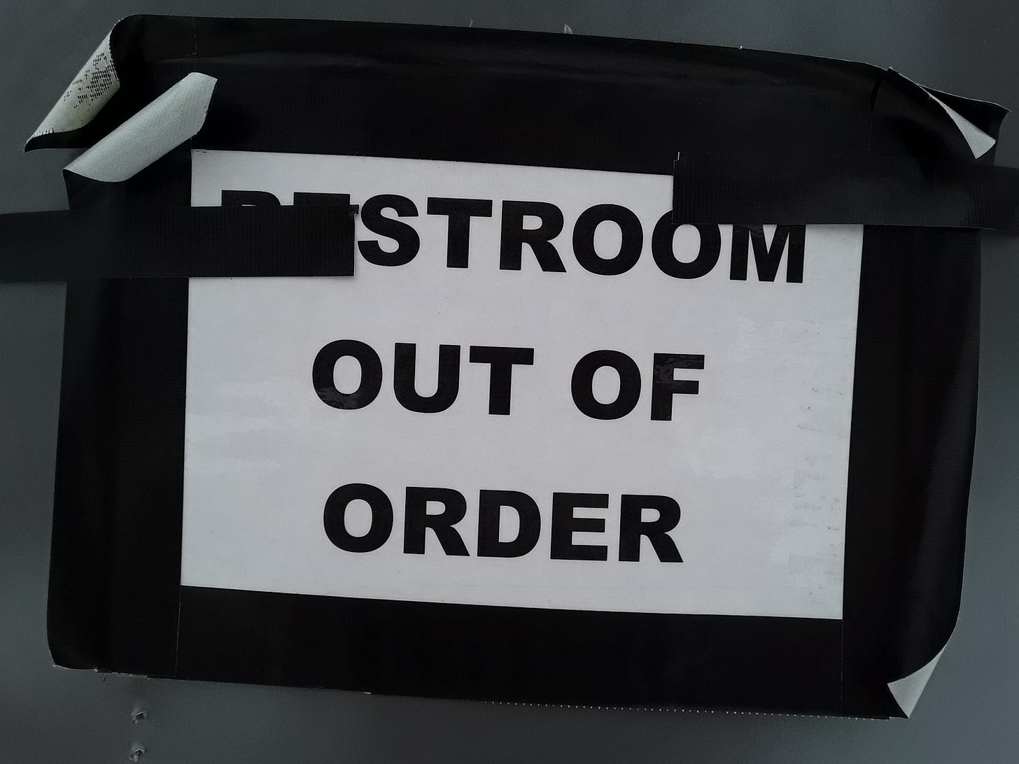 Closeup of the sign on the front door of the Portland Loo at 108 E. Water St. The sign reads "RESTROOM OUT OF ORDER". Photograph taken on the afternoon of Thursday, January 18. Closeup of the sign on the front door of the Portland Loo at 108 E. Water St. The sign reads "RESTROOM OUT OF ORDER". Photograph taken on the afternoon of Thursday, January 18.