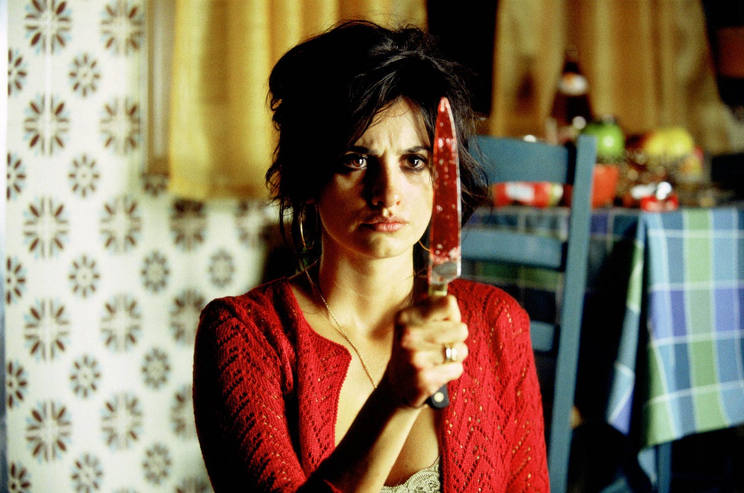 Almodovar's Volver: Red is the colour for danger, passion, love and death.  - Film and Furniture