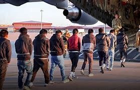 Image result for ice agents wearing masks arresting woman