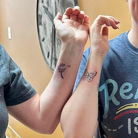 May be an image of 2 people, people smiling and text that says 'ReADING ISA TICKET eNTURe TO*: Το eN N TuRe'