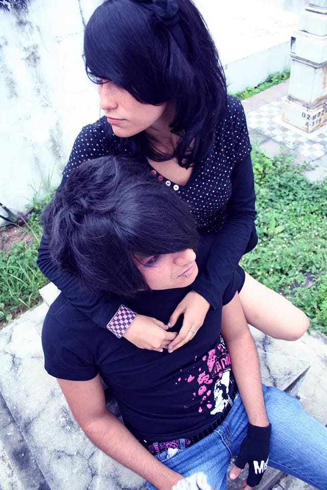 Ecuadorian emo kids from the late 2000s, embodying the distinctive dark aesthetics and emotional expression of the subculture. Ecuadorian emo kids from the late 2000s, embodying the distinctive dark aesthetics and emotional expression of the subculture.