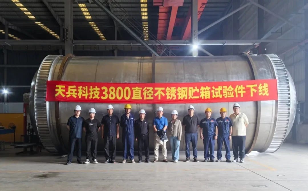 Engineers with Lightyear Exploration’s 3.8-meter diameter stainless steel test tank.