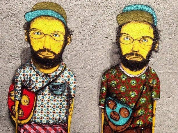 This may contain: two cardboard cut outs of the simpsons characters