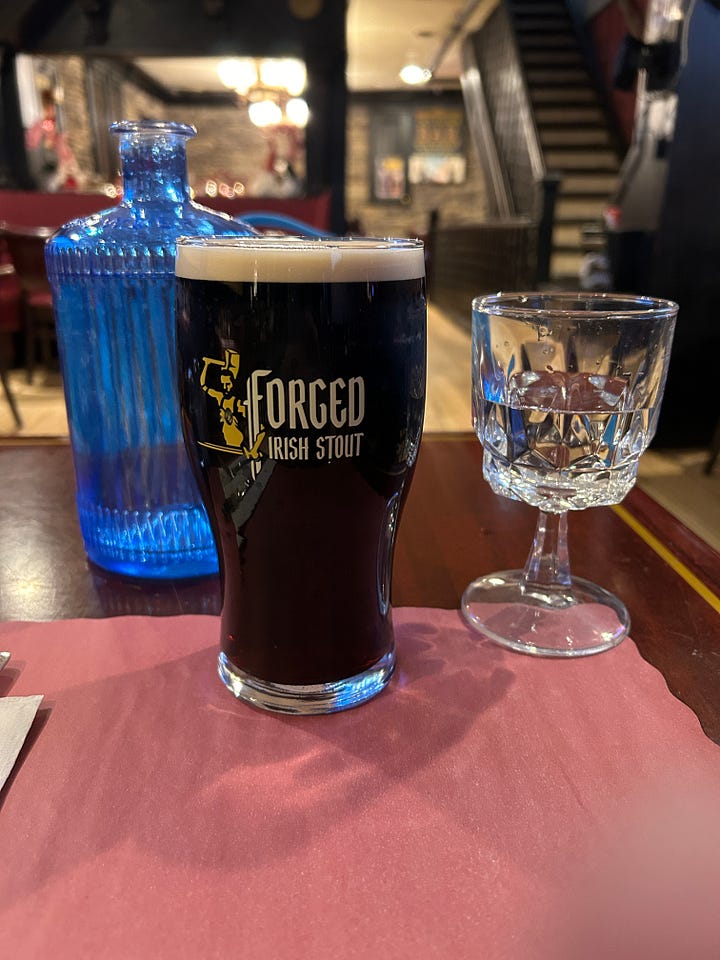Full and empty Forged Irish Stout glass