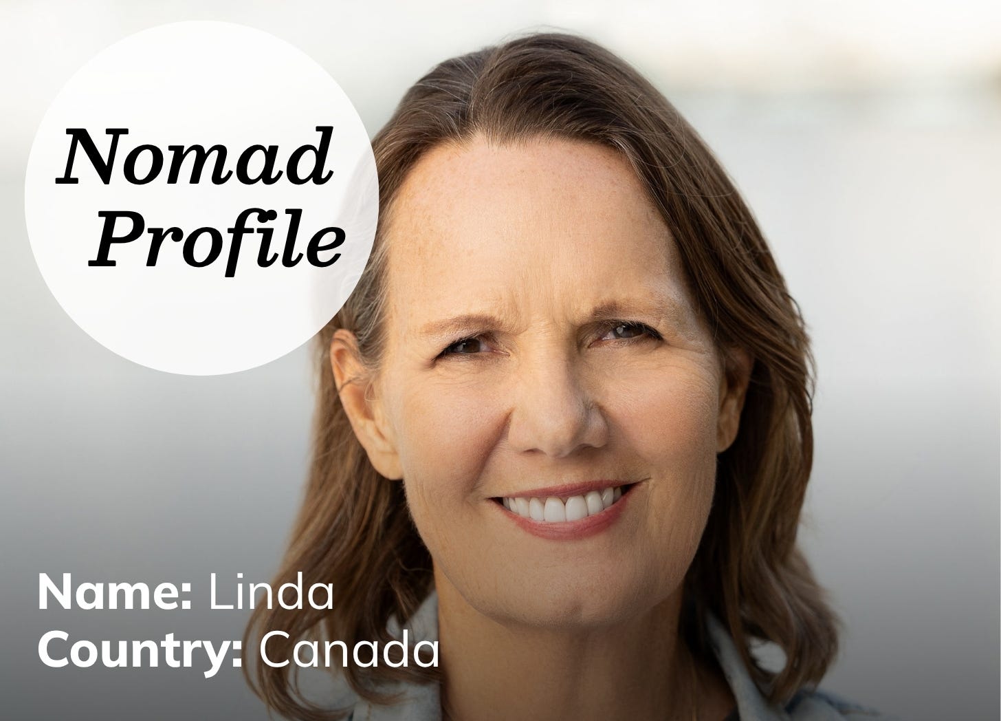 A white woman with chin-length brown hair, smiling and looking at the camera against a white background. 