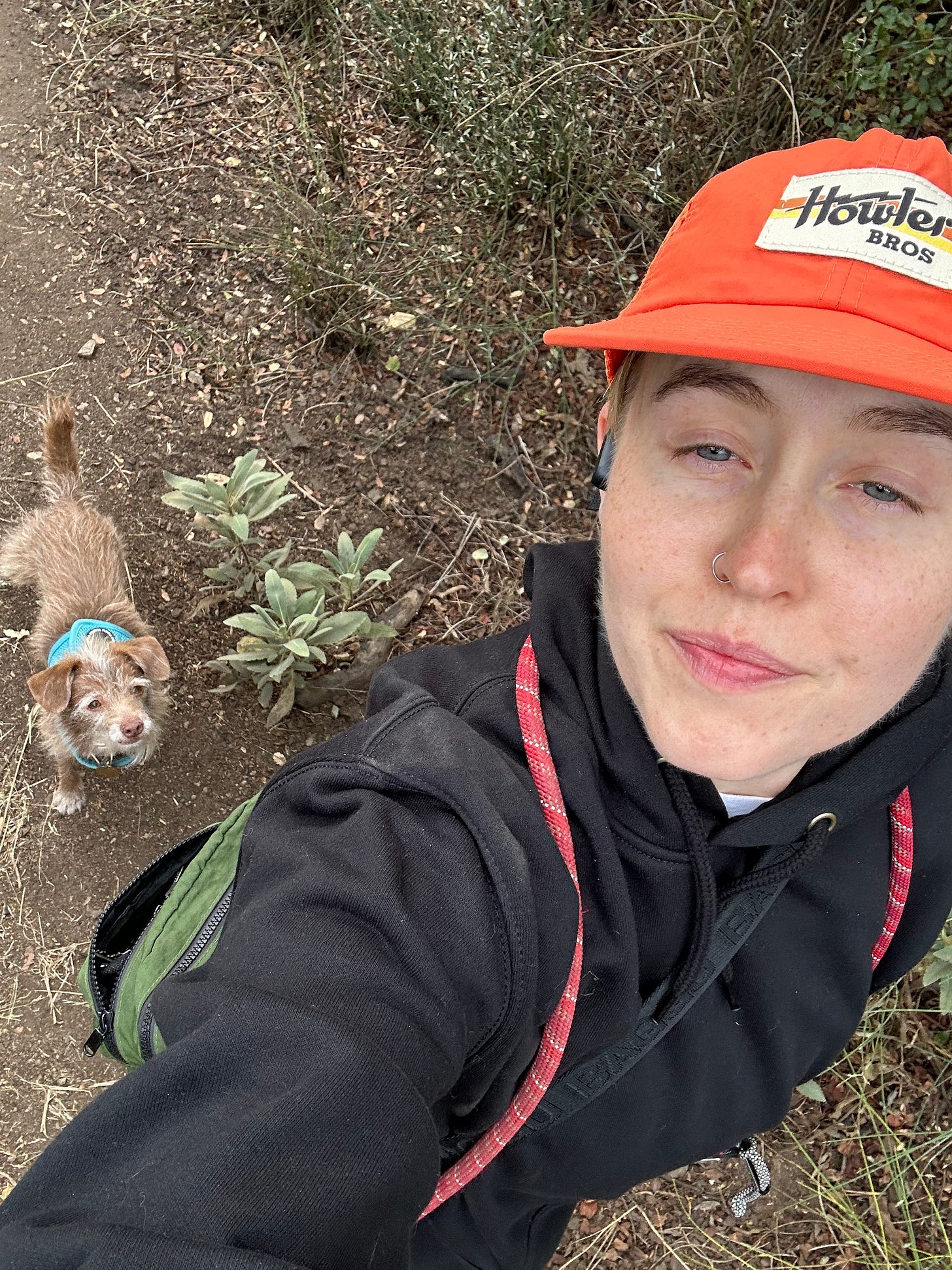 selfie of Fi hiking in Angeles National Forest with a little dog