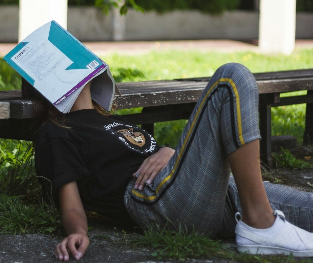 man sitting on surface man sitting on surface