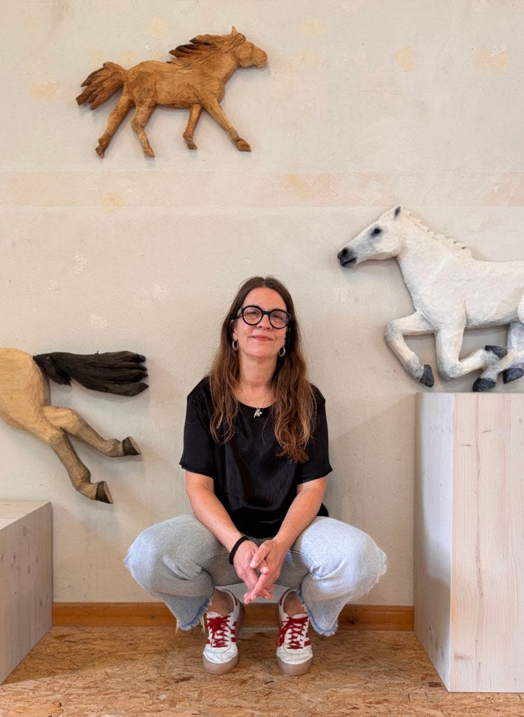 Sculpture by Tina Schneider giving new life to wood through raw, expressive carving. Image courtesy of the artist.