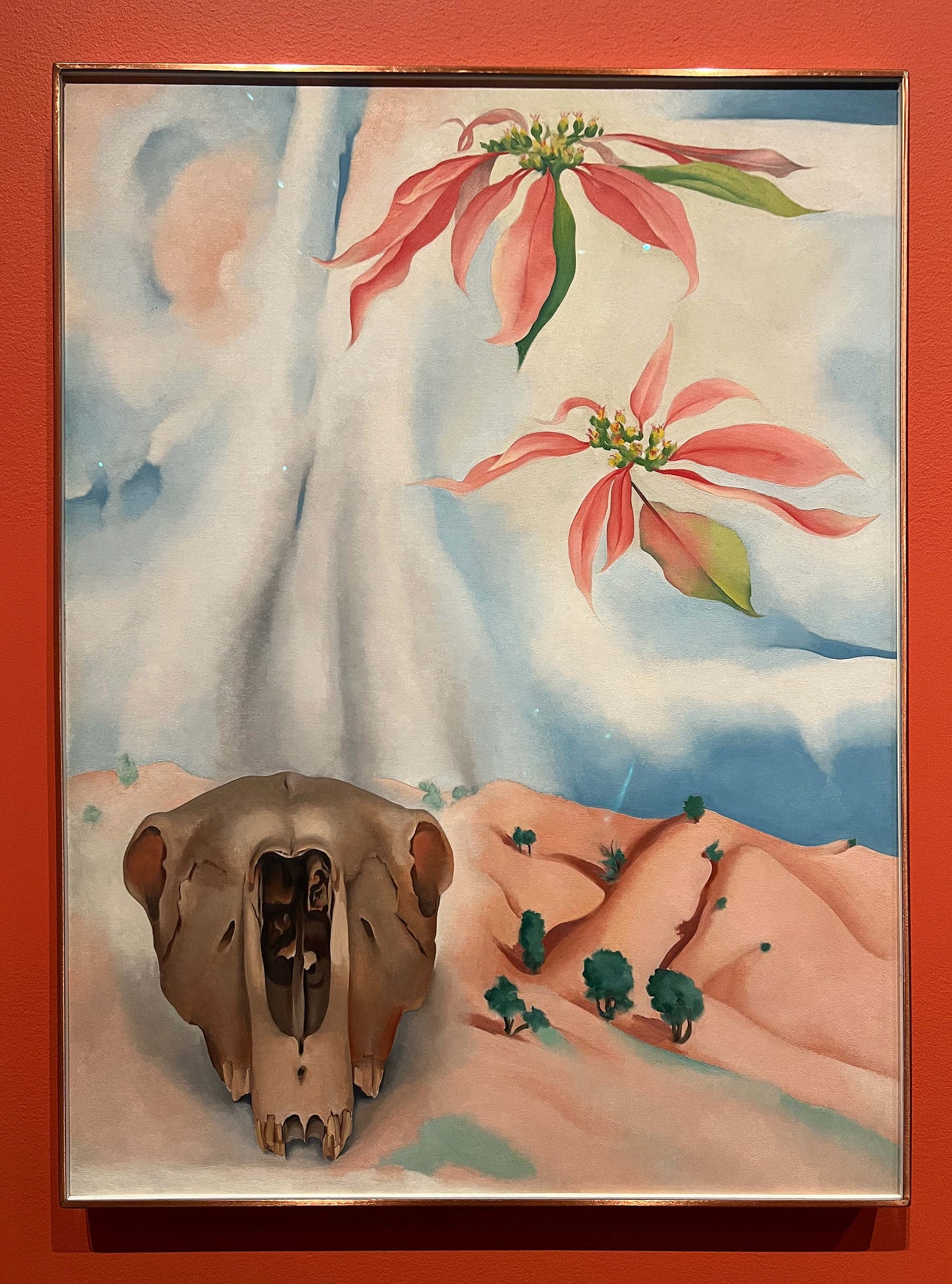 Mule’s Skull with Pink Poinsettia by Georgia O’Keeffe, 1936