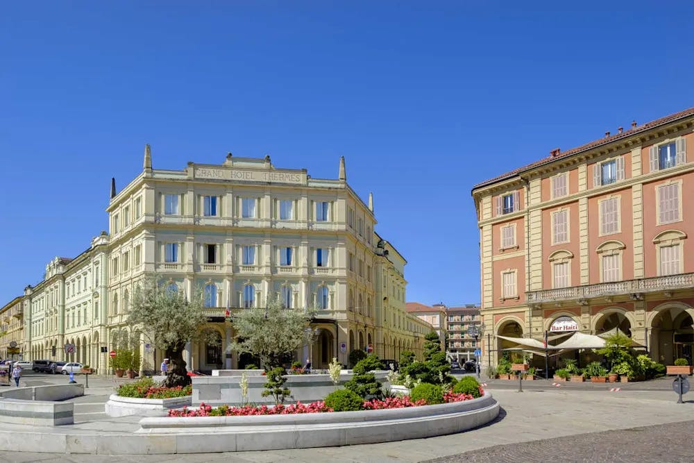 Piazza Italia, the heart of Acqui Terme, is a hub of local life and Roman history. Piazza Italia, the heart of Acqui Terme, is a hub of local life and Roman history.