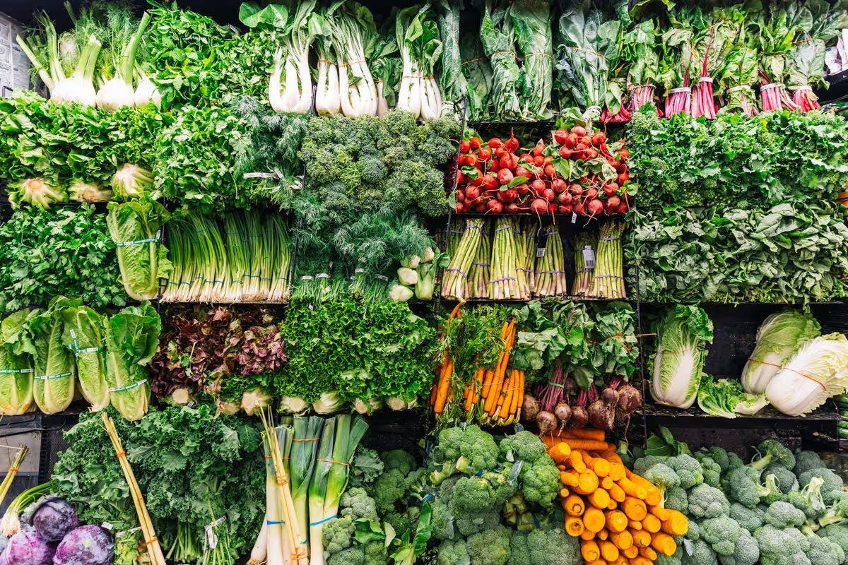 Fresh vegetables on display in a supermarket. Fresh vegetables on display in a supermarket.
